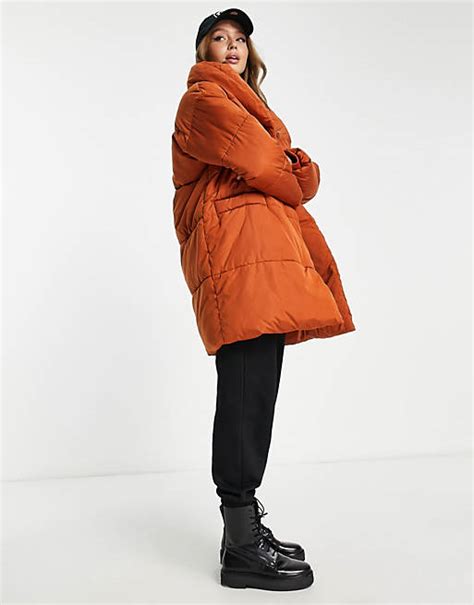 Monki padded coat in rust .